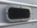 Close-up photo of a Grain Trailer Observation Window on a grain trailer